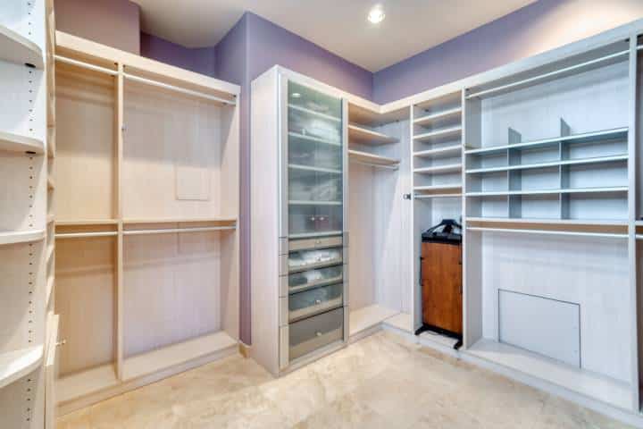 A large and empty spacious walk-in closet