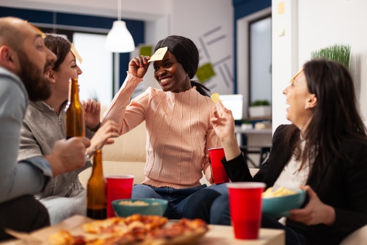 a group of friends playing a fun guessing game