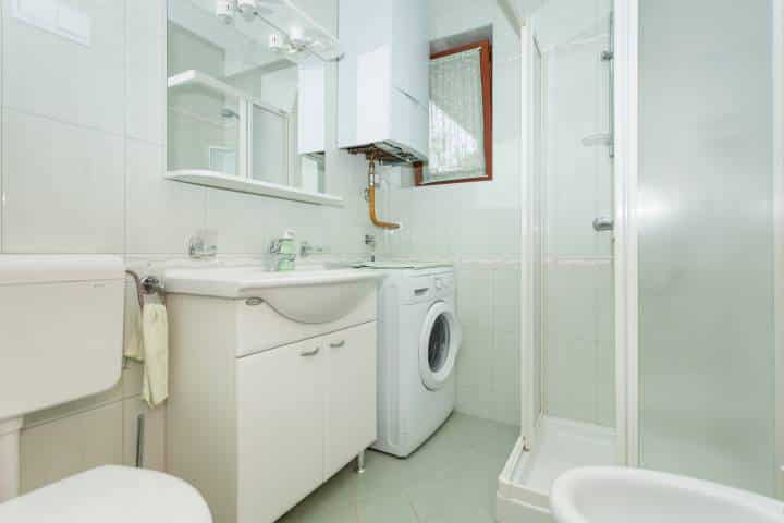 laundry area in the guest bathroom