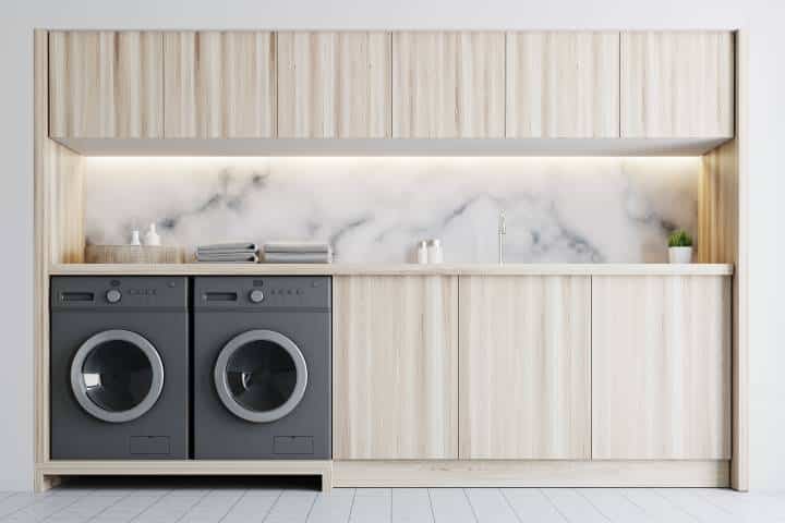 laundry room with seamless cabinetry