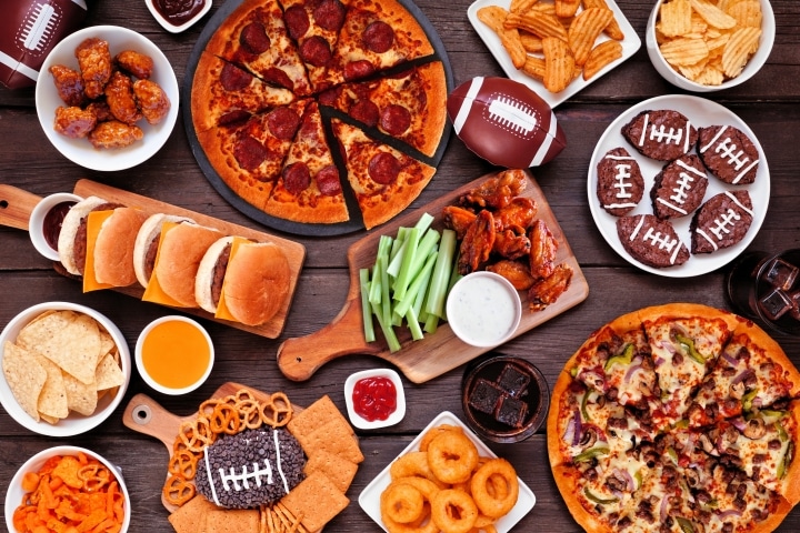 a spread of football-themed snacks for super bowl