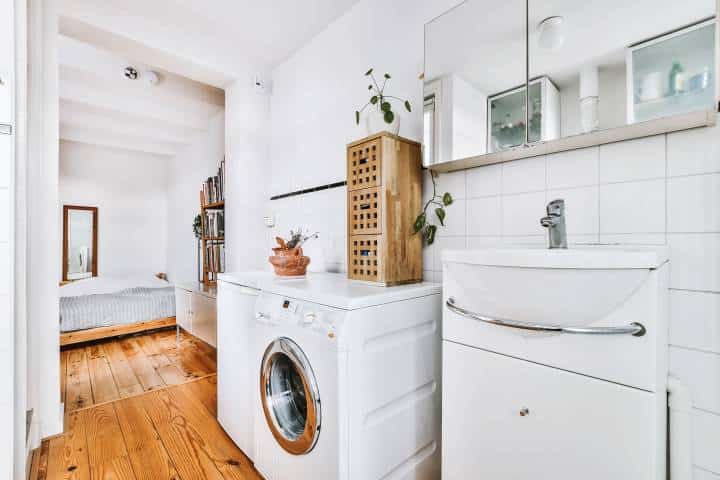 laundry area with thoughtful and chic decor