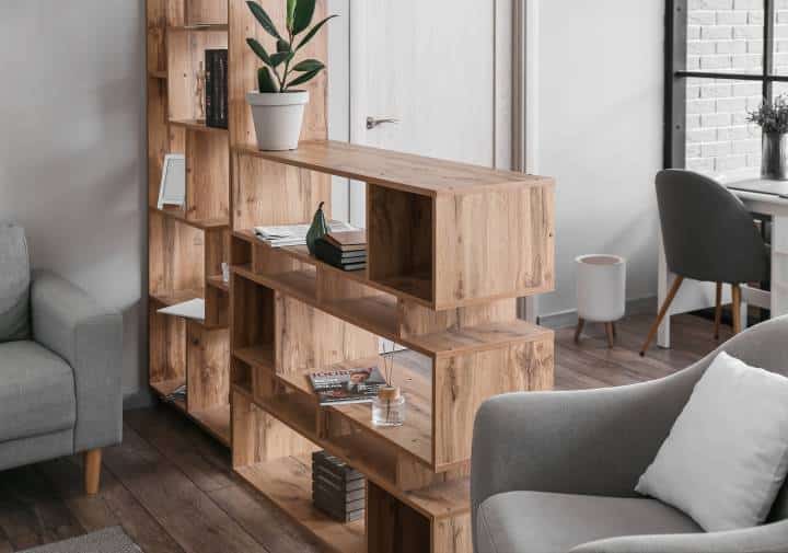 Wooden bookcase divider in living room