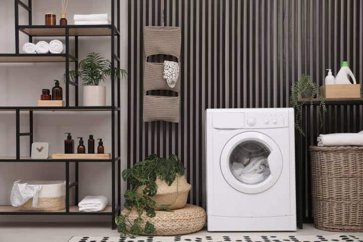 laundry room with visually interesting vertical wall panelling