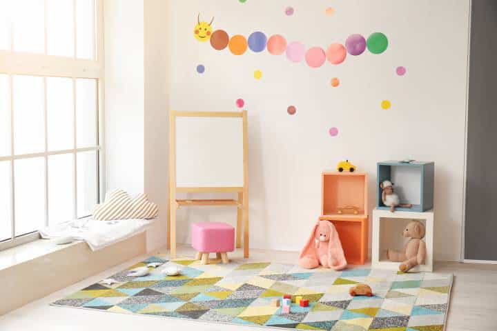 Stylish interior of modern playroom in kindergarten