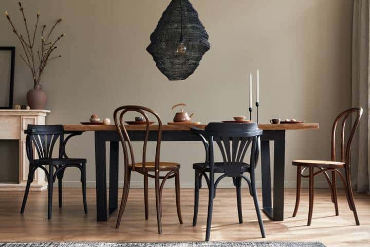 black dramatic overhead lighting in the dining room