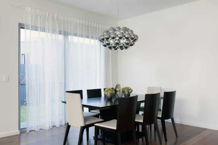 stylish chrome pendant lighting in the dining room