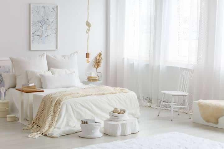 bedroom with cream and gold accents