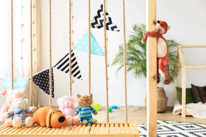 Natural bright baby playroom with eco friendly fabrics and toys