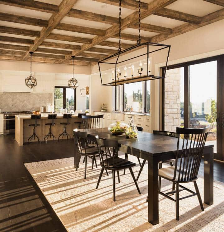 dining room set with geometric lighting