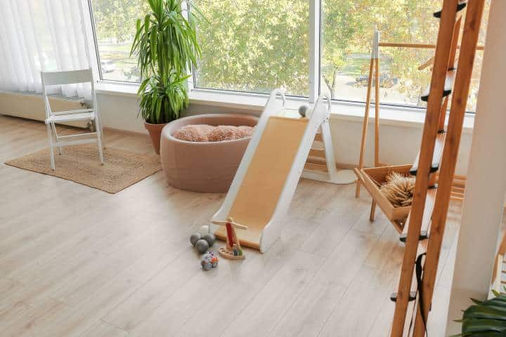 Interior of children's playroom with sliding board