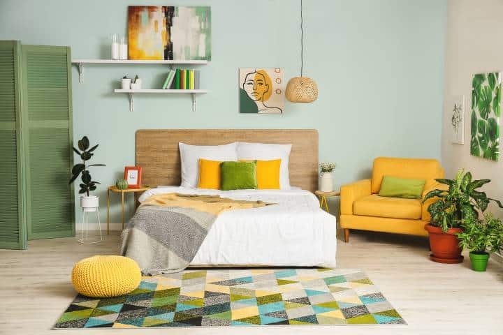 Interior of modern stylish bedroom with yellow accents