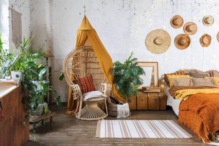 Elegant and quiet bohemian room with cozy mustard yellow interior