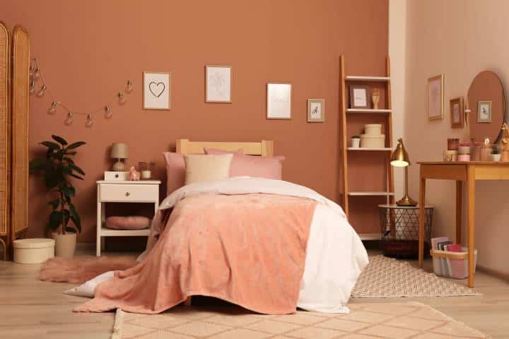 bedroom with peach interiors
