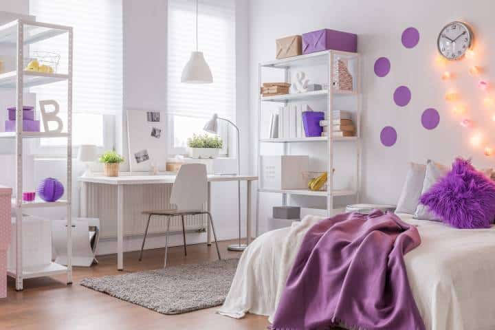 Modern bedroom with purple colour interiors