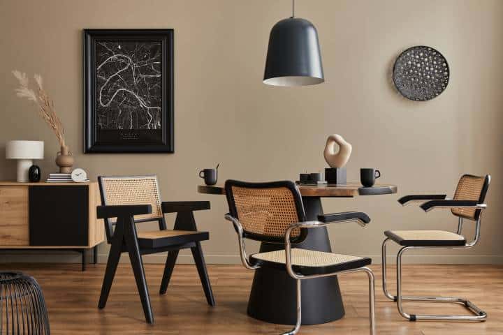 Modern dining room interior with sleek black overhead lighting