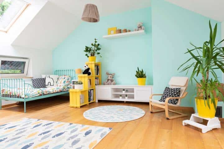 brightly coloured attic bedroom with sun roof