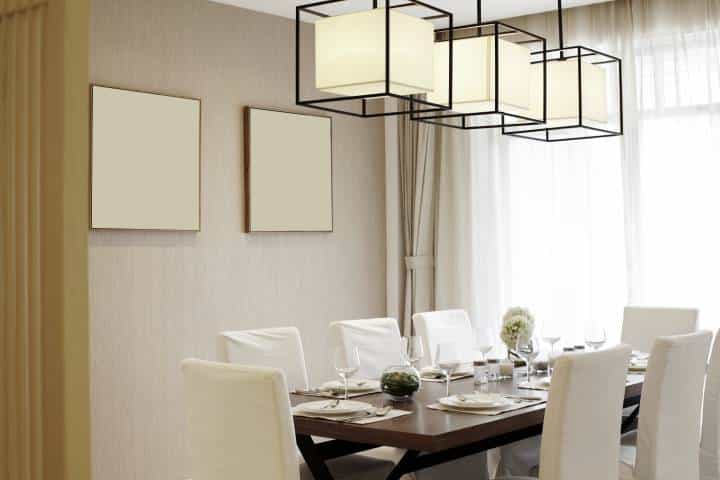 elegant dining room interiors with three-piece overhead lighting
