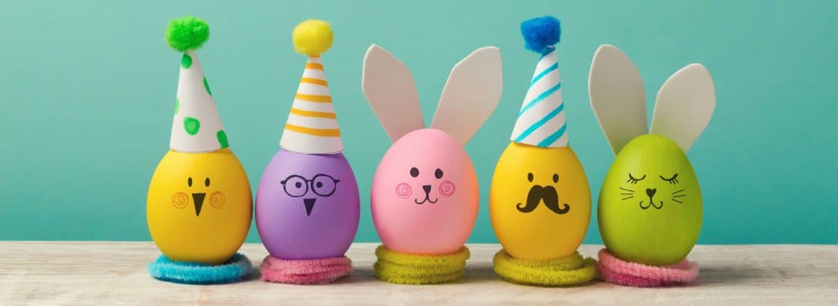 Easter holiday crafts with cute handmade eggs, bunny, chicks, and party hats