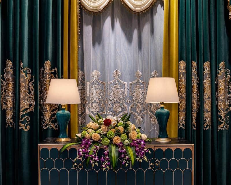 Embroidered curtain. Noble and elegant symmetrical design