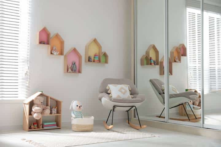 Cute children's room with house shaped shelves