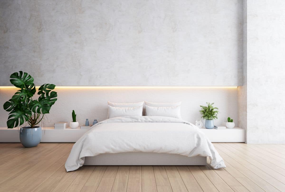 Lighting behind white wall. Modern loft-style bedroom, cosy white and grey room with wood floor 