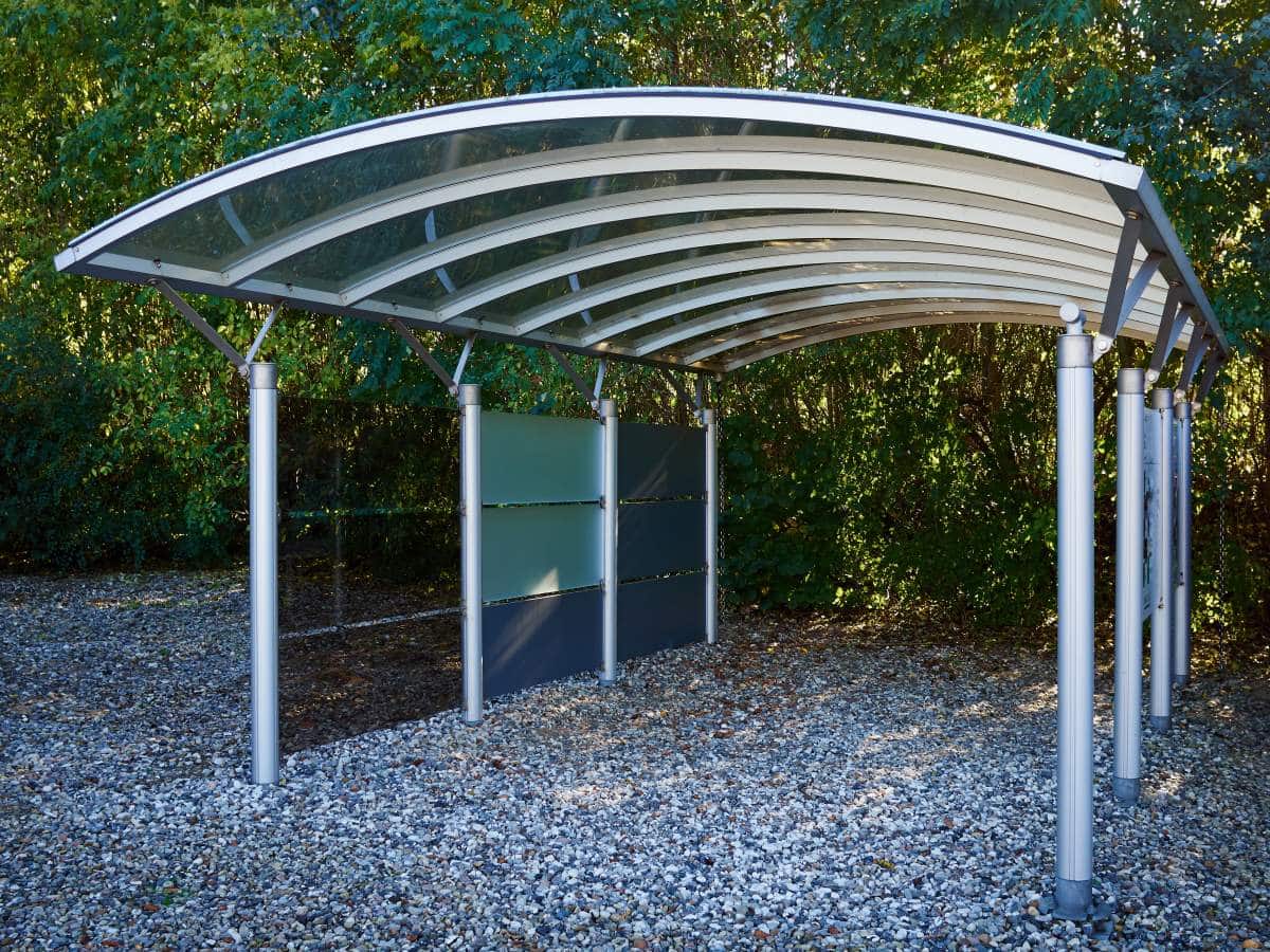 freestanding carport car garage parking made of silver metal and glass