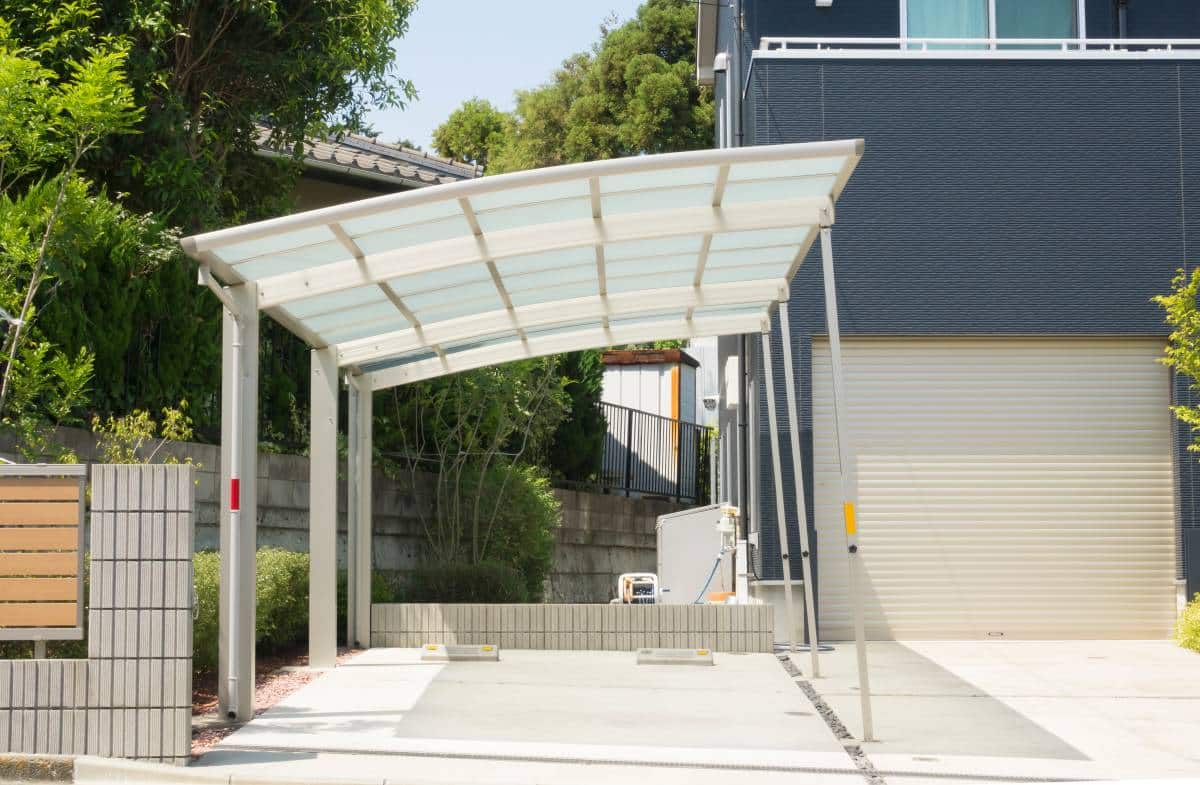 freestanding metal carport with sun-reflective roof