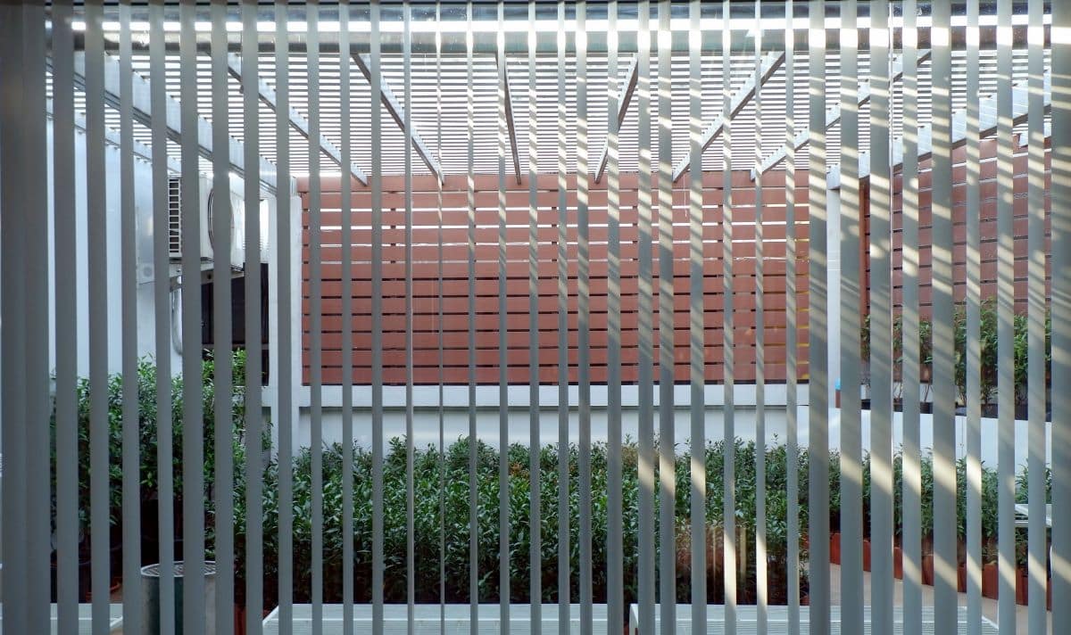 view from inside carport with vertical blind fabric slats 