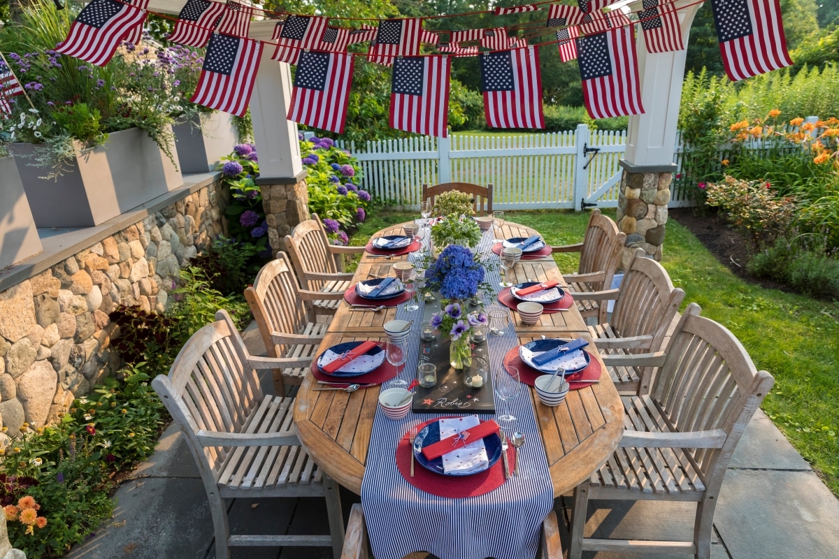 Festive Fourth of July party table set for garden party