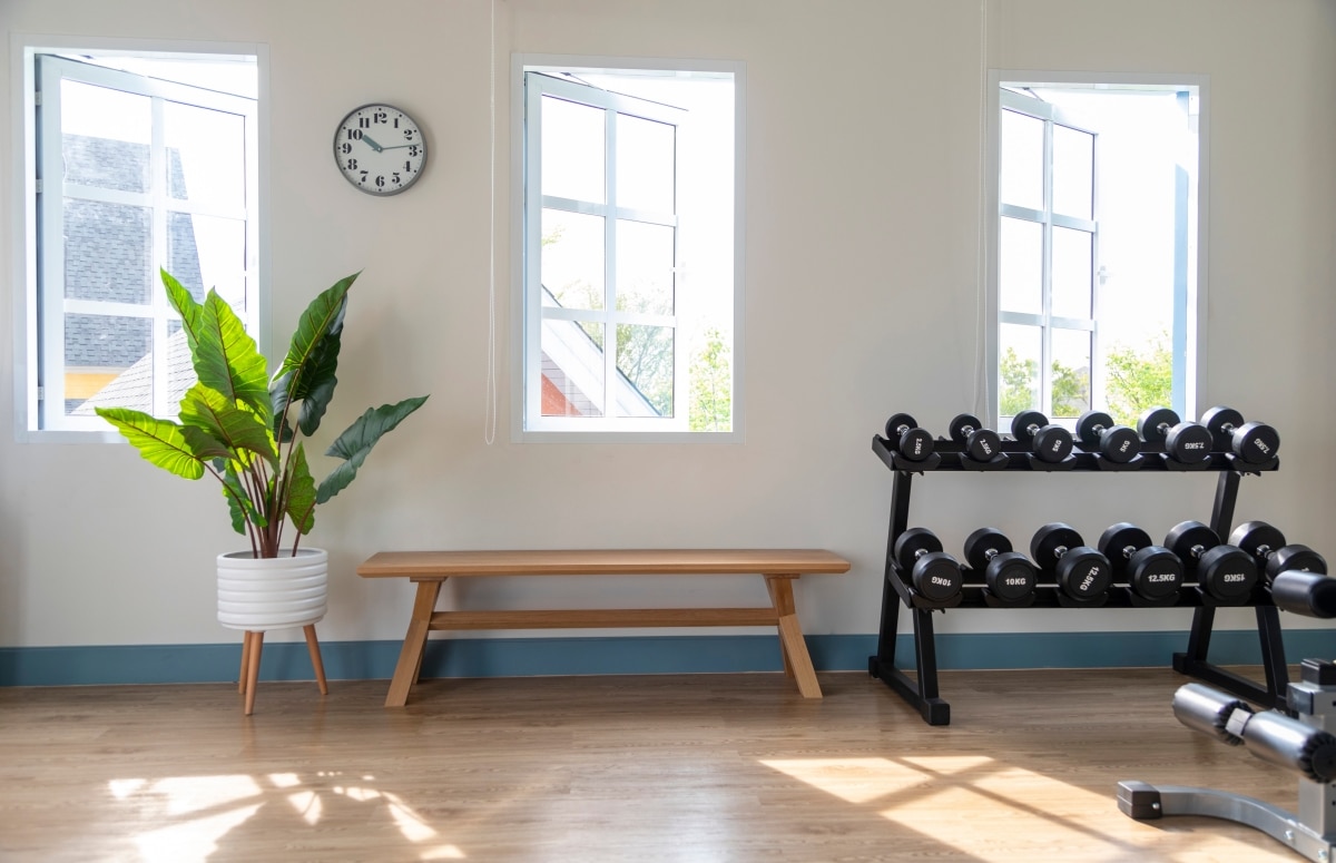 comfy wooden seating in home gym