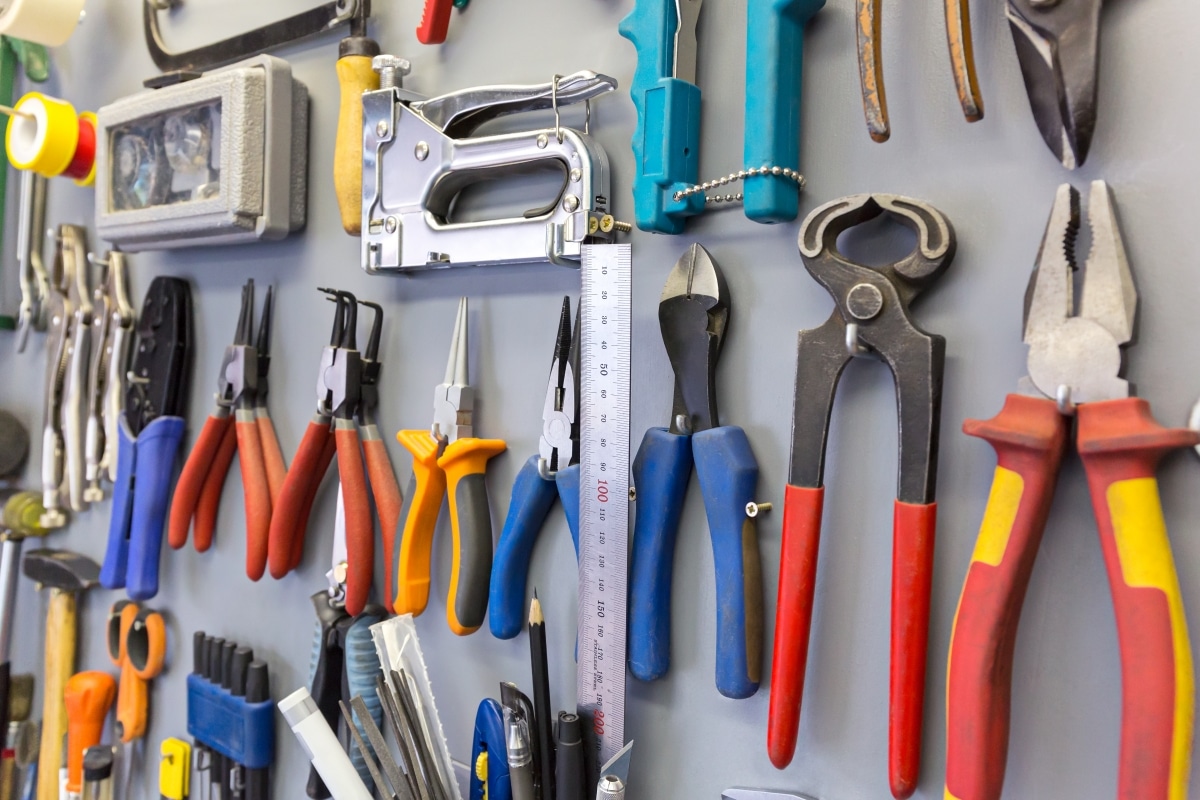 set of tools on wall hangers