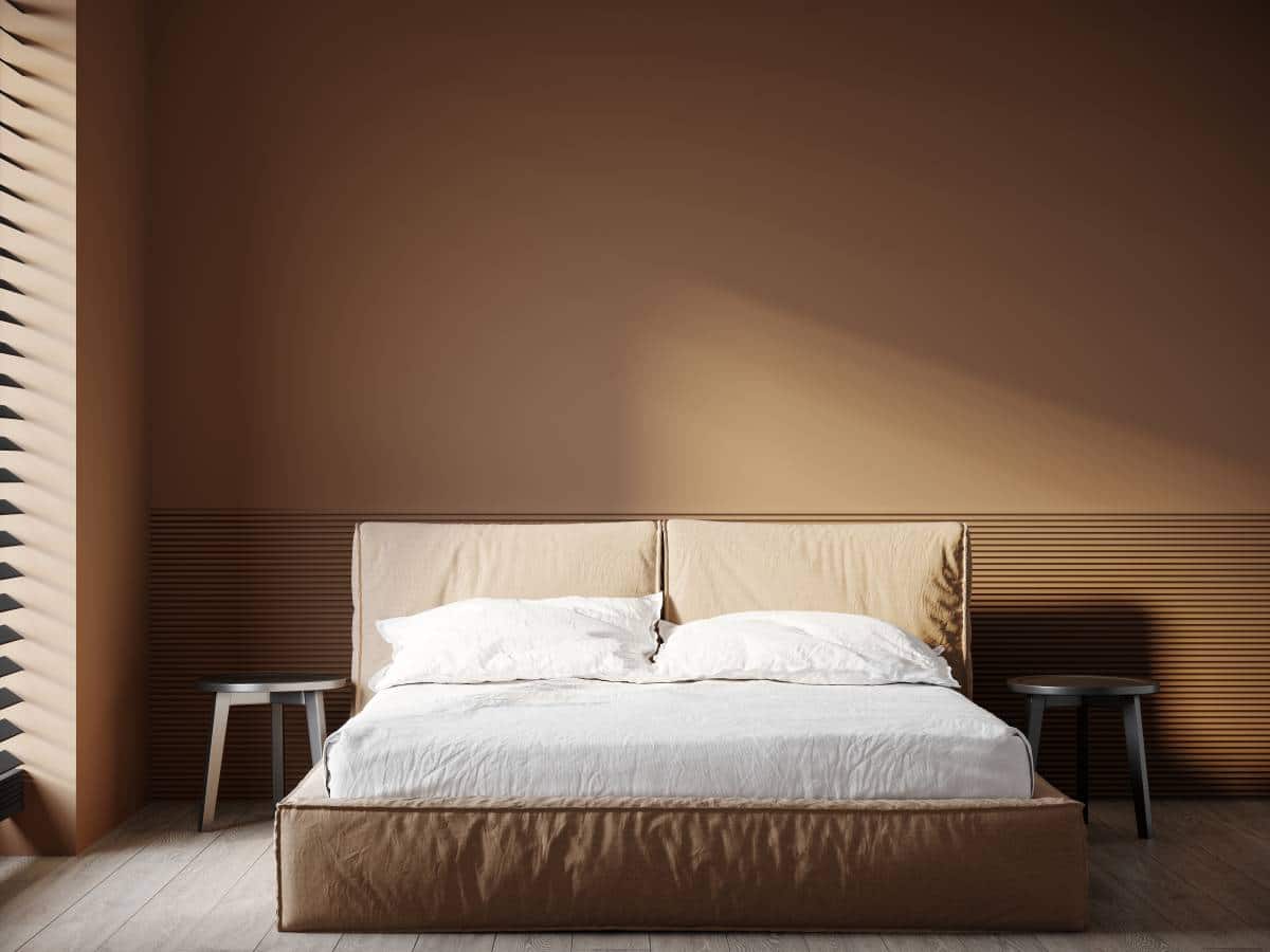 Modern bedroom in creamy dark room colors ivory, chocolate, tan, and taupe.