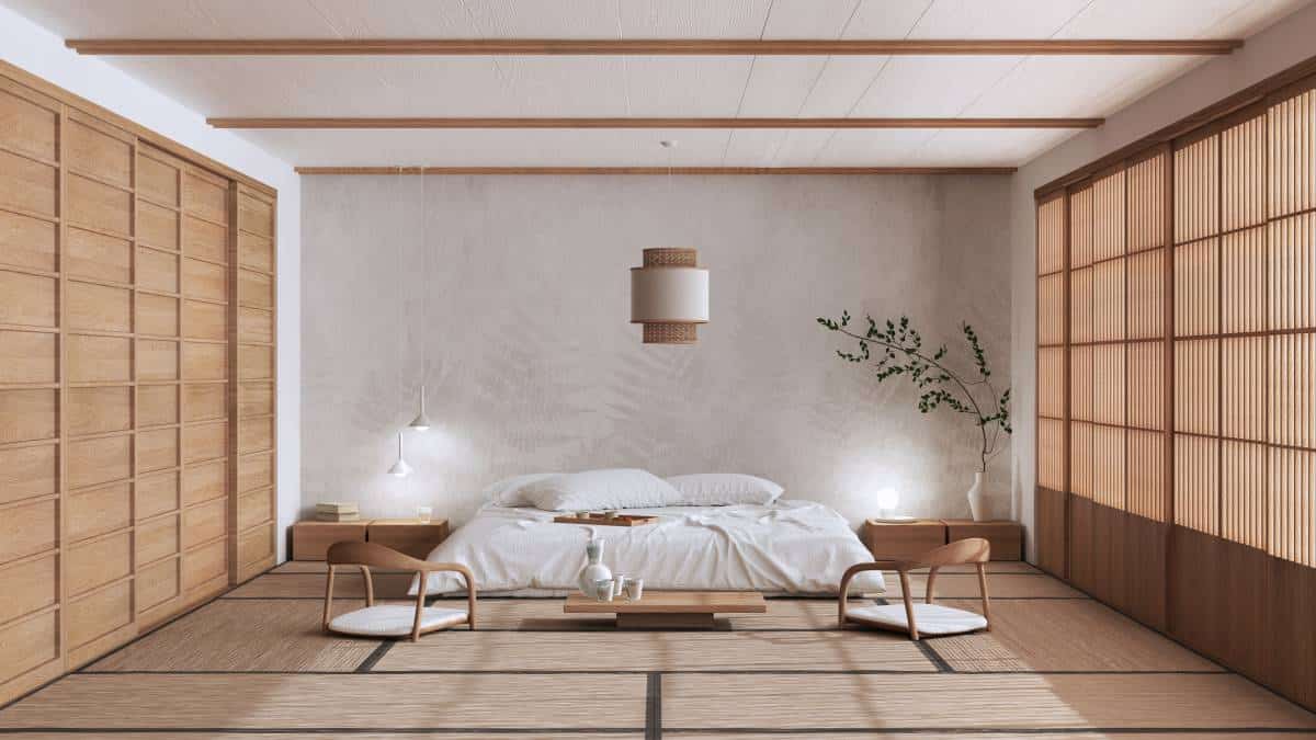 Japanese minimalist bedroom in white and beige tones, with double bed, tatami mats, and meditation zen space