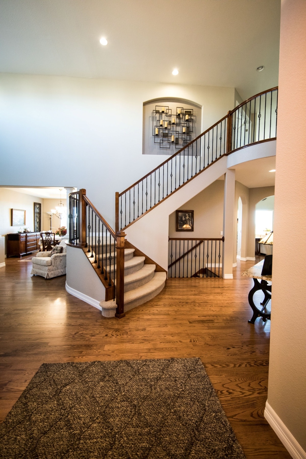 angular staircase area in a room with wooden floors