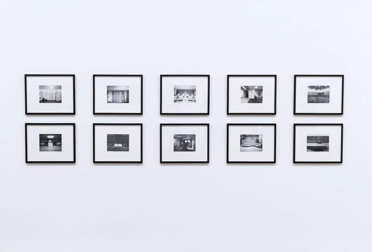 A gallery of ten black-and-white framed photos with plenty of white space