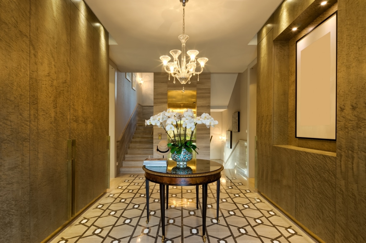 elegant modern hallway entrance with chandelier