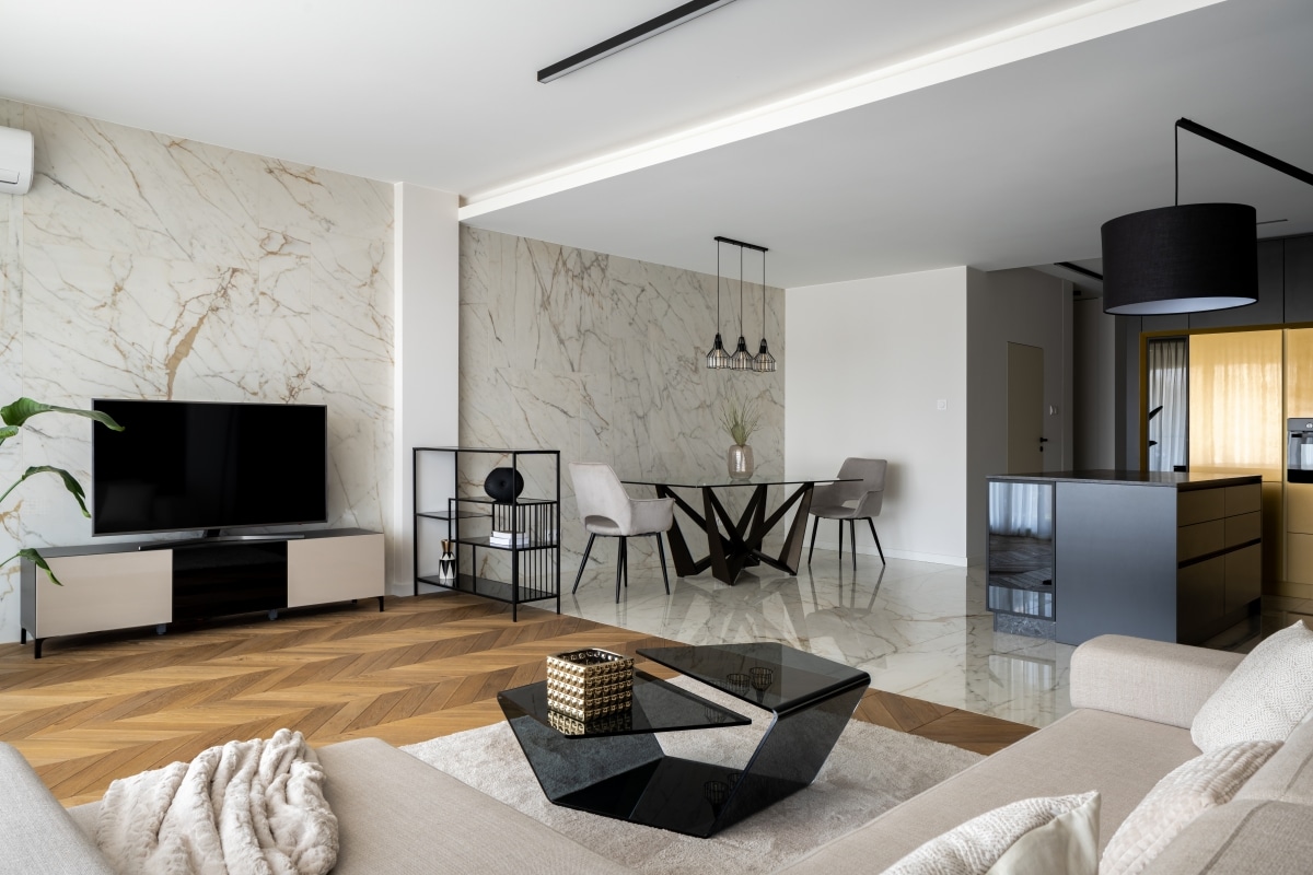 luxurious living room with marble tv accent wall