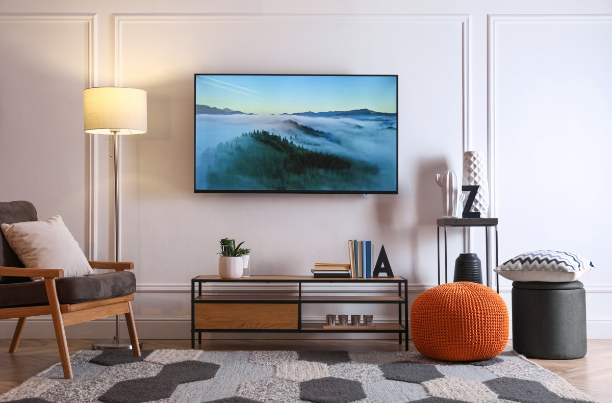 framed tv wall with armchair seating