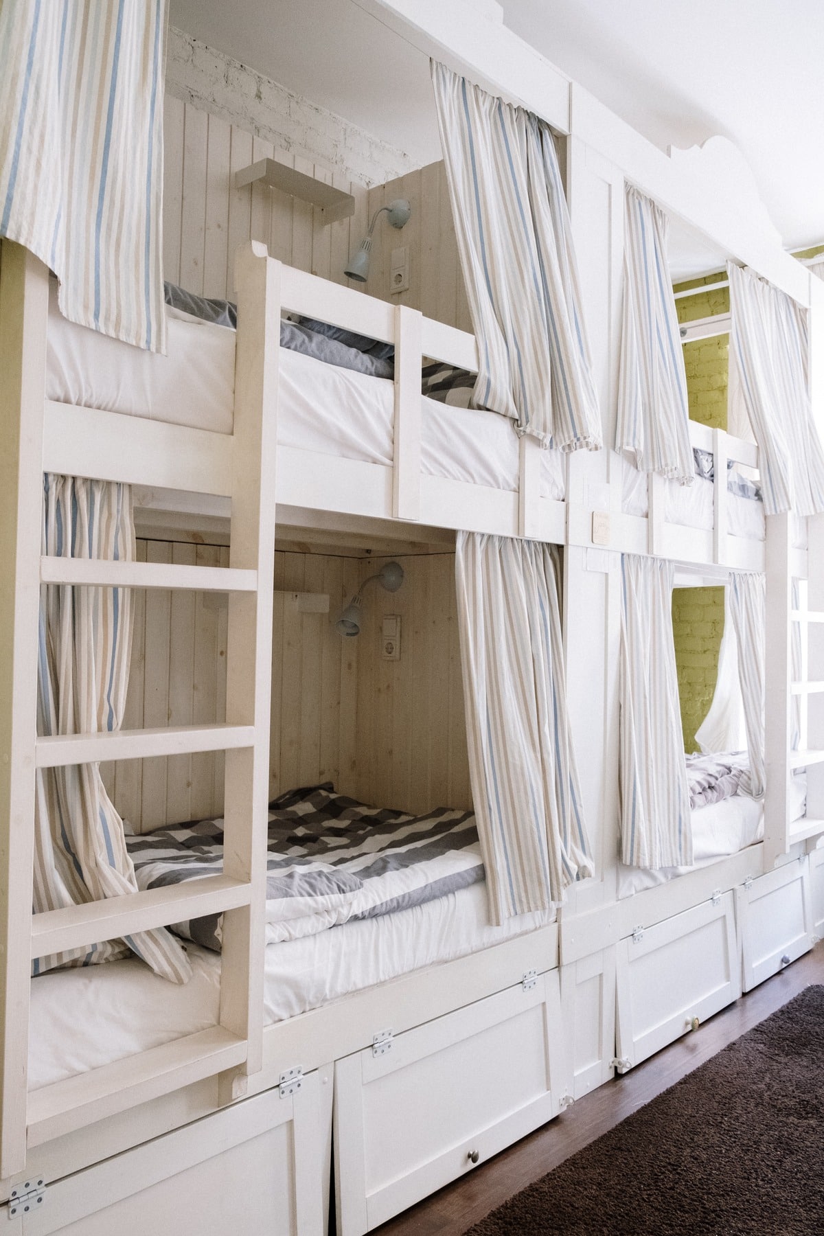 White and brown wooden bunk beds
