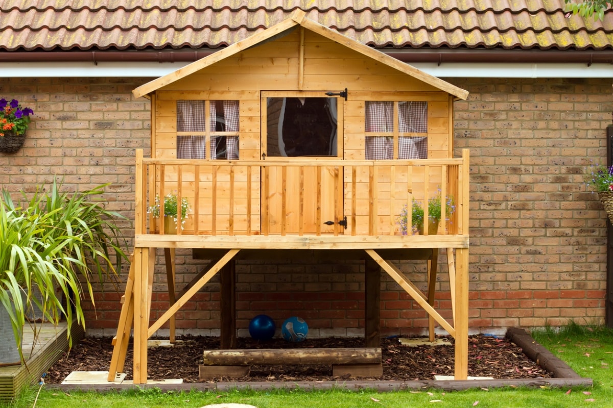 Garden ideas for kids - wooden treehouse