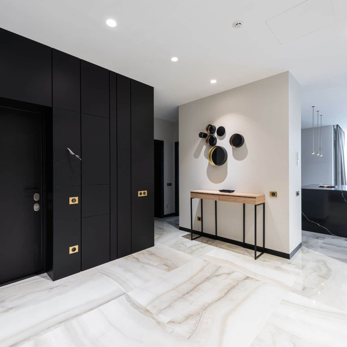 a modern hallway with black and white decor