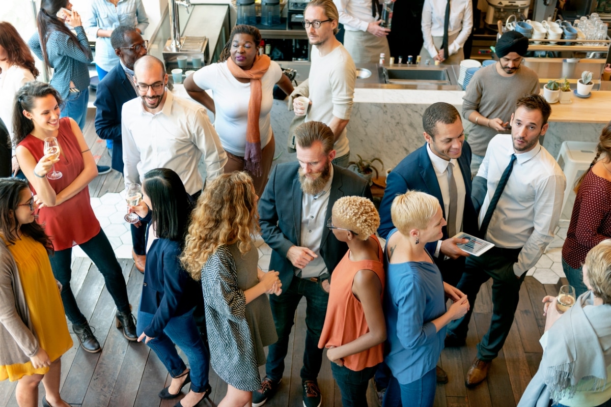 business event with multiple attendees conversing with each other