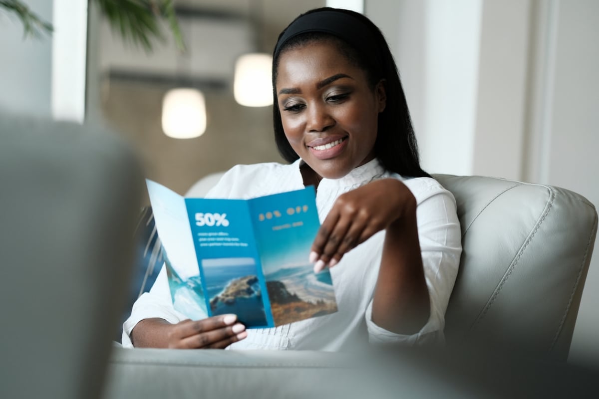 woman reading a brochure