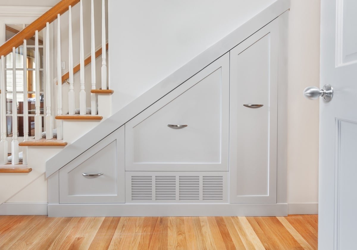 hidden pullout storage under the stairs