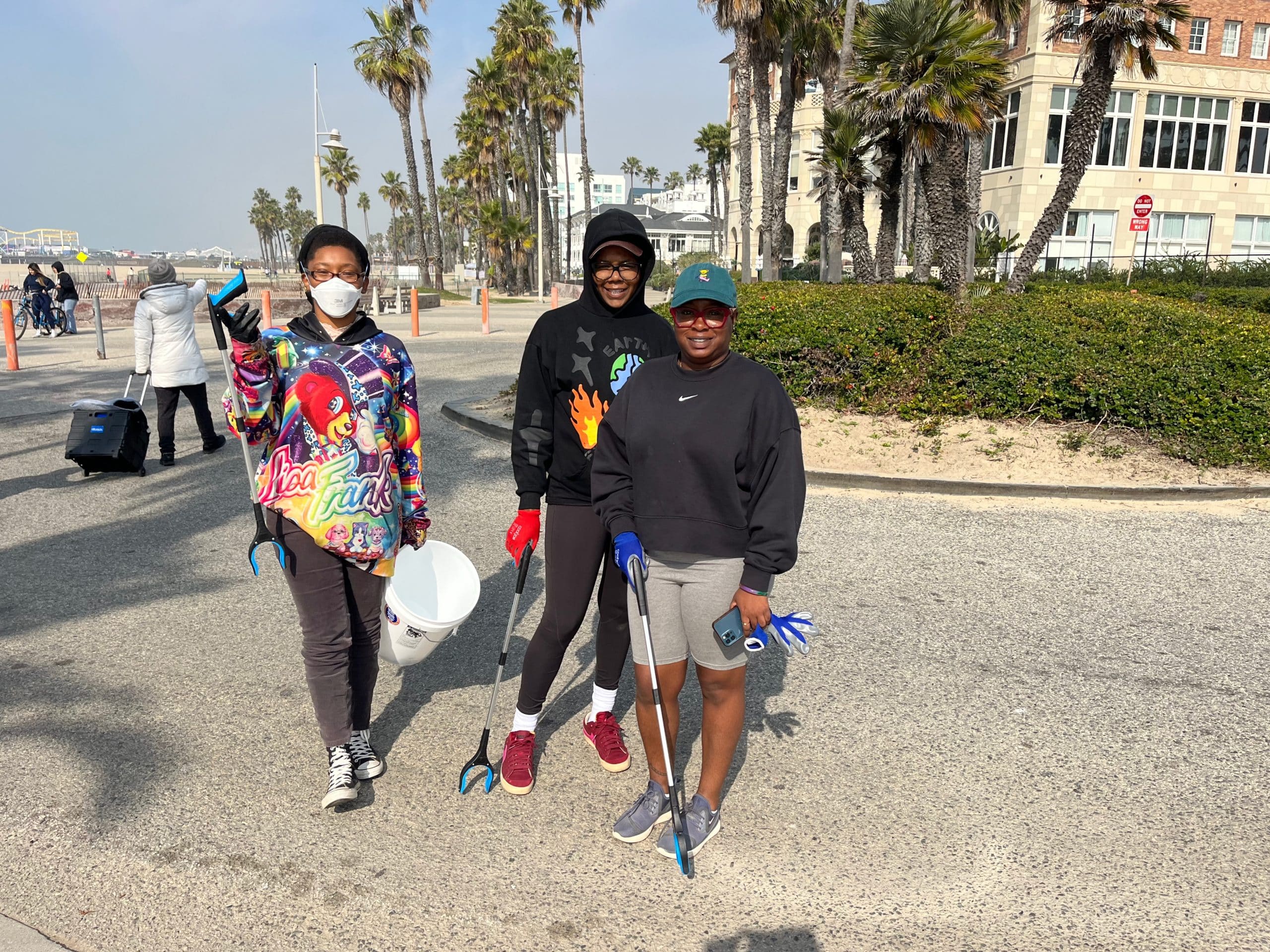 Volunteers cleaning up beach areas in Los Angeles.